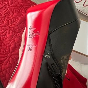 Original christian louboutin ankle boots never worn in original bags and box!